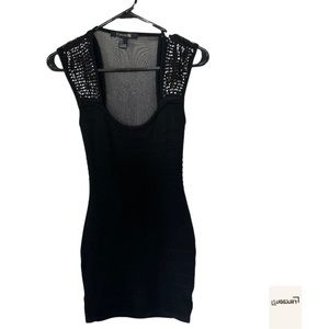 Black mini dress forever21 with sheer back. Sequins on sleeve